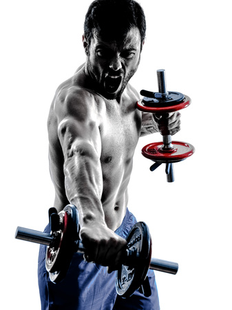 one caucasian man exercising fitness weights exercises in studio silhouette isolated on white backgroundの写真素材