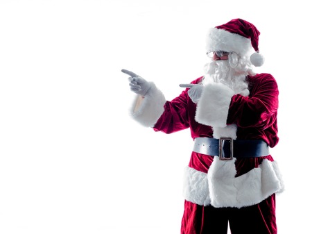 one santa claus man showing pointing  silhouette isolated on white backgroundの写真素材