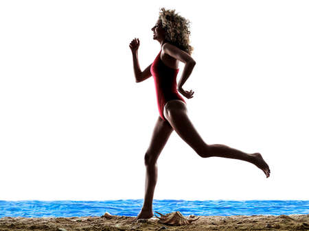 woman on the beach sea sunbathing holidays vacations silhouette isolated on white backgroundの写真素材