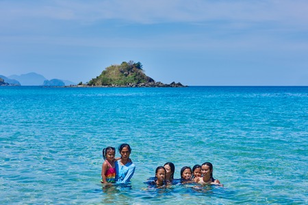 Nacapan Palawan Philippines-April 5, 2015 :filippino natives people bathing on a island between El Nido and coron in Palawan Philippinesのeditorial素材