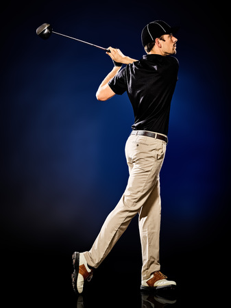 one caucasian  man golfer golfing isolatedの写真素材