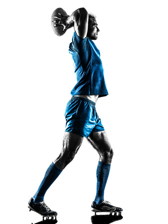 one caucasian rugby man player silhouette isolated on white backgroundの写真素材