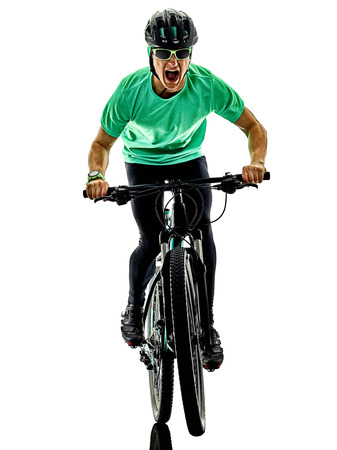 one caucasian man practicing man mountain bike bking isolated on white background with shadowsの写真素材