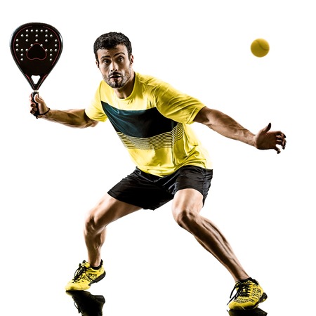 one caucasian man playing Padel tennis player isolated on white backgroundの写真素材