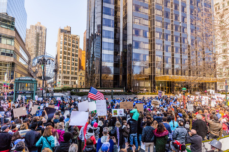New York CITY, USA - APRIL 2, 2018 : New yorker on a demonstration protest march for gun control in front of the Trump hotel  in New York City USAのeditorial素材