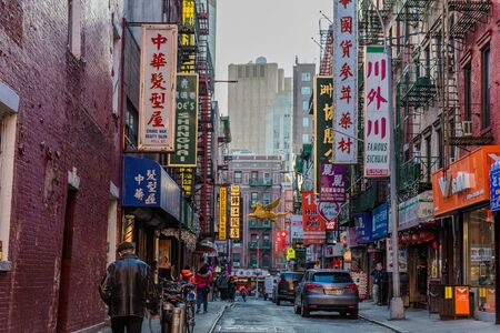NEW YORK CITY- MARCH 27, 2018 : Chinatown streets one of the main Manhattan Landmarksのeditorial素材
