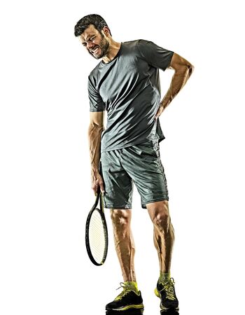 one caucasian mature tennis player man physical pain injury in studio isolated on white backgroundの写真素材