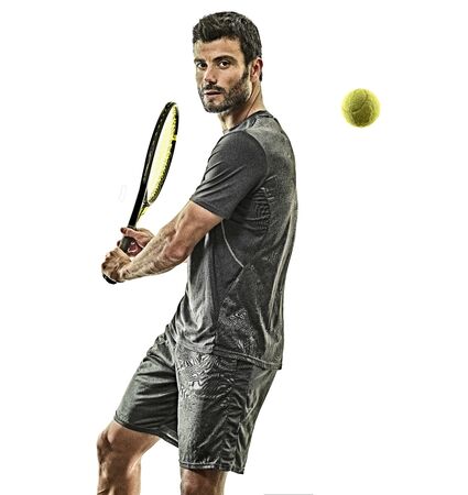 one caucasian mature tennis player man backhand in studio isolated on white backgroundの写真素材