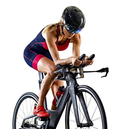 one caucasian woman practicing triathlon triathlete ironman studio shot isolated on white backgroundの写真素材