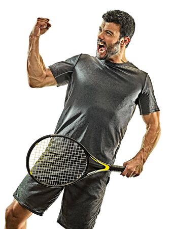 one caucasian mature tennis player man happy winner strong powerful in studio isolated on white backgroundの写真素材