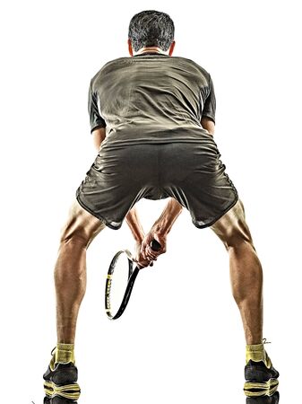 one caucasian mature tennis player man back rear view in studio isolated on white backgroundの写真素材