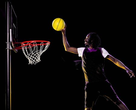 african basketball player man isolated black backgroundの写真素材
