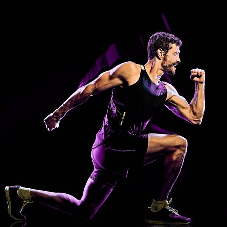 fitness cardio boxing exercise body combat man isolated black backgroundの写真素材
