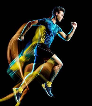 runner running jogger jogging man isolated light painting black backgroundの写真素材