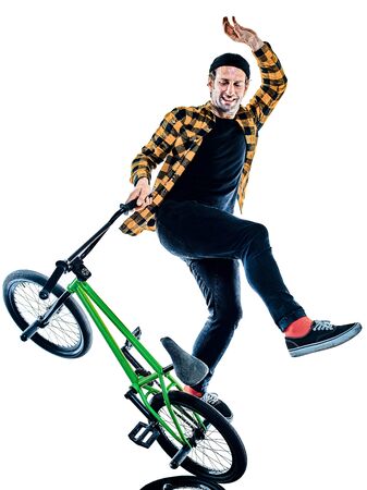 BMX rider cyclist cycling freestyle acrobatic stunt isolated white backgroundの写真素材