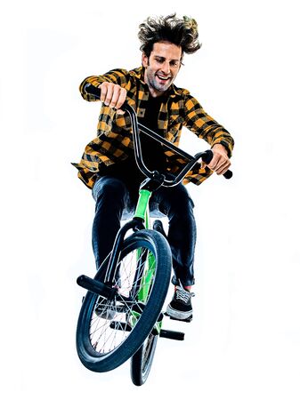 BMX rider cyclist cycling freestyle acrobatic stunt isolated white backgroundの写真素材