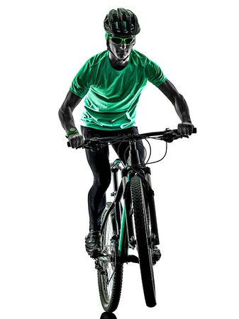 tenager boy mountain bike bking isolated shadowsの写真素材