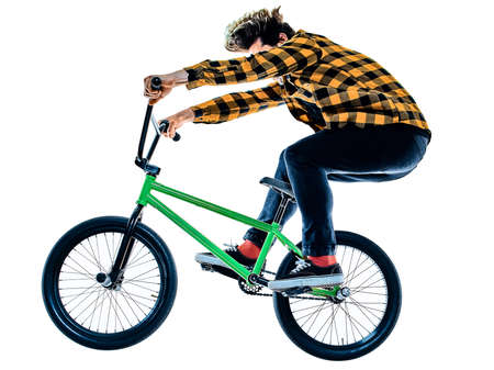 BMX rider cyclist cycling freestyle acrobatic stunt isolated white backgroundの写真素材