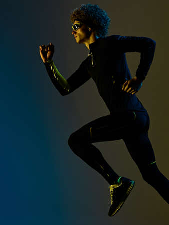 youg runner jogger running jogging man silhouette isolated white backgroundの写真素材