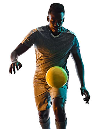 young african soccer player man isolated white background silhouette shadowの写真素材