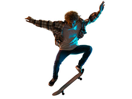 young man skateboarder Skateboarding isolated white background shadow silhouetteの写真素材