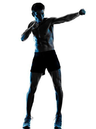 young man fitness exercise exercIsing shadow isolated white background silhouetteの写真素材