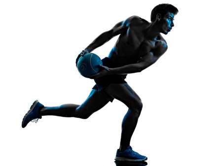 young man fitness exercise weight shadow isolated white background silhouetteの写真素材