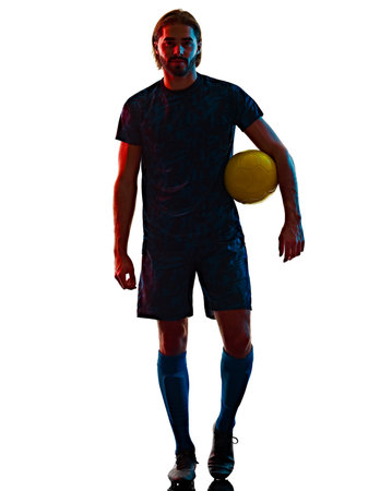 young soccer player isolated white background silhouette shadowの写真素材
