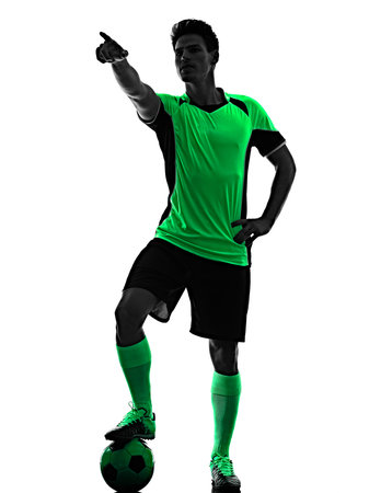 young soccer player man silhouette shadow isolated white backgroundの写真素材