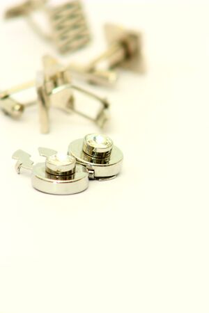 clothespin tie golden color in focus, away Cufflinks Cufflinks Button shirts in Focusの写真素材