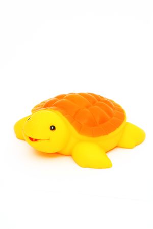 Turtle, yellow, red, orange, smile, eyes, carapace, legs, rowing, sailing, diving  Turtle toy rubber bathの写真素材