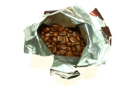 accidentally spilled a pack of coffee beansの写真素材