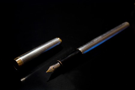 A steel pen with goldの写真素材
