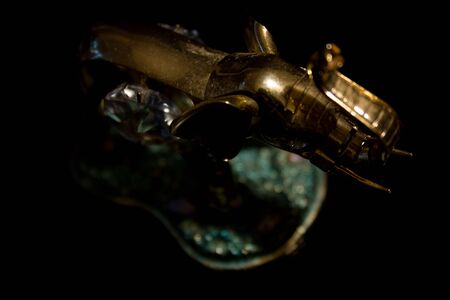 Jewellery gold statuette elephant crystals on a black backgroundの写真素材