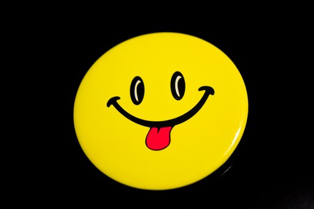 sign face smile black background languageの写真素材