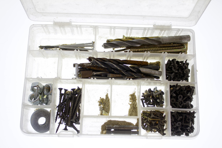 plastic case with hardware items closeupの写真素材