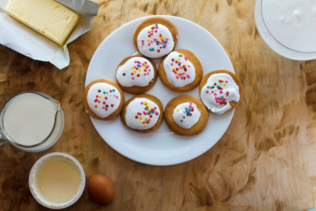 Ingredients for baking on a wooden background top view