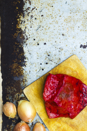 Raw meat on metal background, top view, borderの写真素材
