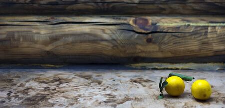Two lemont on wooden backgroundの写真素材