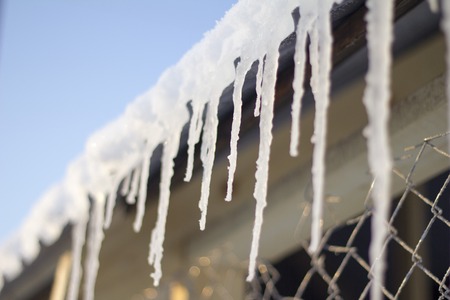 icicles from the roof of springの写真素材