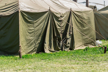 Detail with the exterior of a green military tent. summerの写真素材