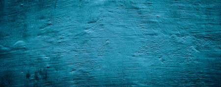 blue and black concrete wall background texture with plasterの写真素材