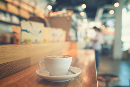 Coffee cup at coffeeshop vintage tone, Thailandの写真素材