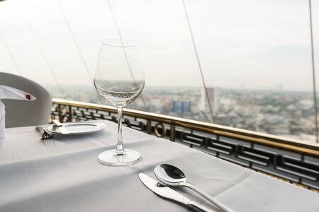 Empty glasses set in restaurantの写真素材