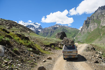 KASHMIR, INDIA - July 14 : Car tourist on the way go to snow moutain on July 14,2015 in KASHMIR, INDIAのeditorial素材