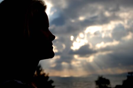 Russian girl in sunset lightの写真素材
