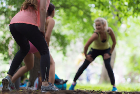 Fitness group dance in a park on a sunny day