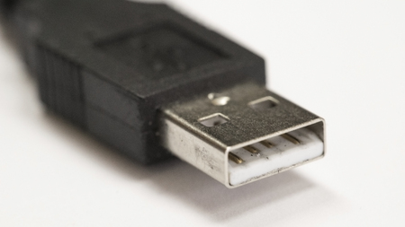 Macro shot of USB Cable and connector on white backgroundの写真素材