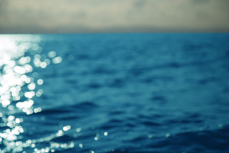 High contrast ocean surface texture at sunset.の写真素材