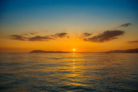 Sea scape scene. Sunset on the ocean beachの写真素材